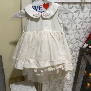 Beautiful detail in buttons and length in dress! Worn once!!